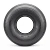INVICTA GOLF PRO turf-saver in profile, showing a smooth unbroken tread edge and a plain rounded sidewall carrying no lugs